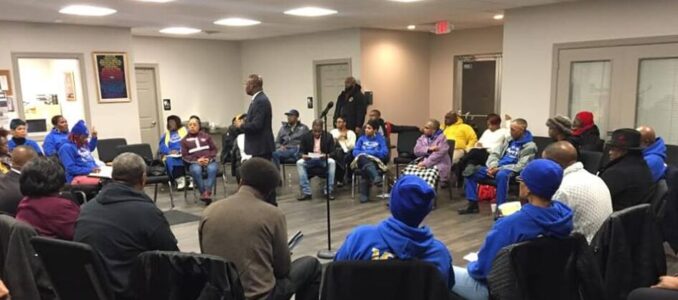A group of parents in a community center.